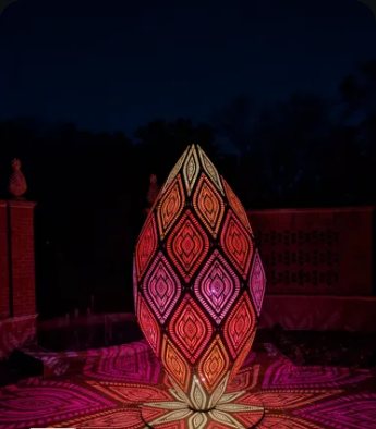 Illuminated patterned lantern at night