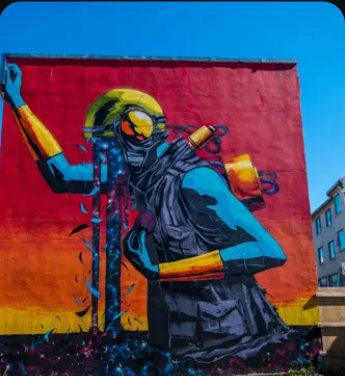 Colourful street mural of a person with a helmet